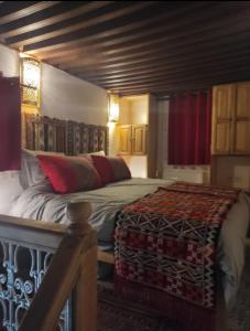 Postel nebo postele na pokoji v ubytování Riad Averroès