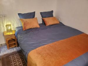 Postel nebo postele na pokoji v ubytování Riad Averroès