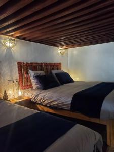 Postel nebo postele na pokoji v ubytování Riad Averroès