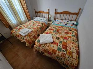 Postel nebo postele na pokoji v ubytování Corralazo B