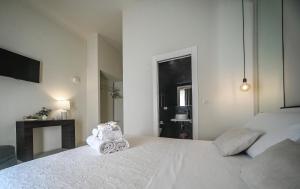 Postel nebo postele na pokoji v ubytování 42 Zanardelli B&B