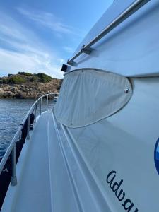 a view of the bow of a boat on the water at Mythos in Porto Ercole