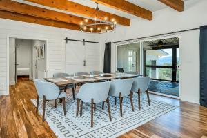 a dining room with a table and chairs at Chianti by AvantStay Stunning Secluded Ranch in Cloverdale