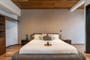 Letto o letti in una camera di Cabaña de lujo en La Toscana Mazamitla 1
