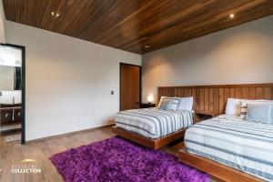 Letto o letti in una camera di Cabaña de lujo en La Toscana Mazamitla 1