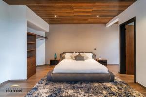 Letto o letti in una camera di Cabaña de lujo en La Toscana Mazamitla 1