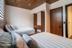 Letto o letti in una camera di Cabaña de lujo en La Toscana Mazamitla 1