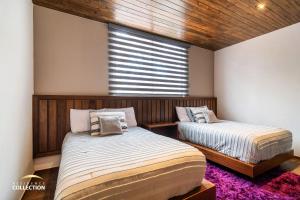 Letto o letti in una camera di Cabaña de lujo en La Toscana Mazamitla 1