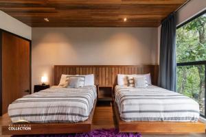 Letto o letti in una camera di Cabaña de lujo en La Toscana Mazamitla 1