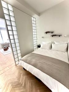 Postel nebo postele na pokoji v ubytování Magnifique appartement - Quartier Louise!
