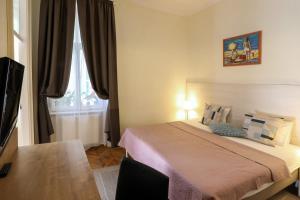 Postel nebo postele na pokoji v ubytování Ozone Private Rooms