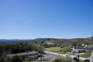 a view of a city with a road and a building at Howard Johnson by Wyndham Lexington in Lexington