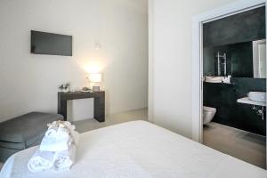 Postel nebo postele na pokoji v ubytování 42 Zanardelli B&B