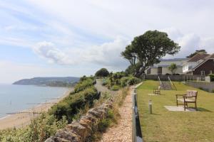 a view of the beach from a house at The Beach Retreat - Pet Friendly in Sandown