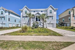 a row of apartment buildings with palm trees in front at New Listing, Luxury 4bd Steps to Beach Club in Pensacola