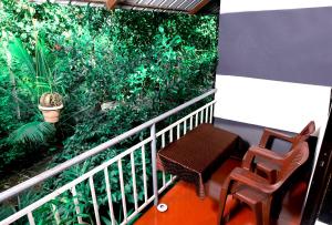 Balkón nebo terasa v ubytování The wayside cottage Munnar
