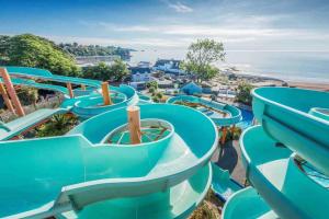 a water slide at a water park at Hoburne Devon Bay - Hot Tub 2 Bed Paignton in Paignton