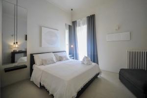Postel nebo postele na pokoji v ubytování 42 Zanardelli B&B