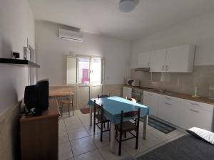 Η κουζίνα ή μικρή κουζίνα στο Capu Cilona