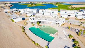 an aerial view of a resort on the beach at Costa Divina LV 12 Brand New by Kivoya in Puerto Peñasco