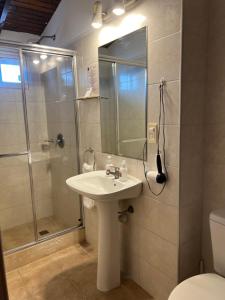 Koupelna v ubytování Hotel Concorde