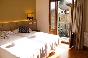 Postel nebo postele na pokoji v ubytování Hotel valle de turtzioz