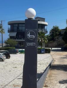a street sign with a white ball on top of it at Loucerna Suites Chania in Chania Town