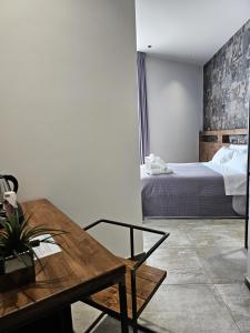Postel nebo postele na pokoji v ubytování Binario1 Rooms