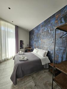 Postel nebo postele na pokoji v ubytování Binario1 Rooms