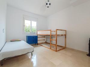 Posteľ alebo postele v izbe v ubytovaní REZAL Urb Águila Cálida y preciosa casa cerca de la playa