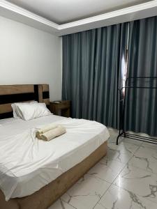 A bed or beds in a room at CONVENIO RESIDENCIAL