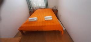 Posteľ alebo postele v izbe v ubytovaní Pedestrian Street Apartment