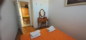 Posteľ alebo postele v izbe v ubytovaní Pedestrian Street Apartment