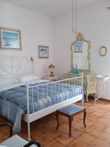 Ένα ή περισσότερα κρεβάτια σε δωμάτιο στο Casa del 1° Mulino