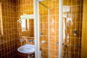 Koupelna v ubytování Hotel Alpenhof