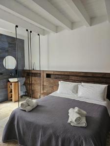 Postel nebo postele na pokoji v ubytování Binario1 Rooms