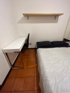 Postel nebo postele na pokoji v ubytování Ciamarra Rooms