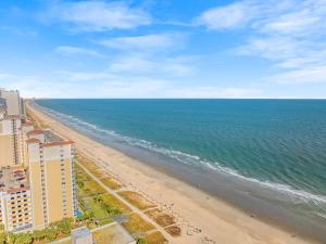 an aerial view of a beach and the ocean at Fin's Inn in Myrtle Beach