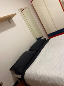 Postel nebo postele na pokoji v ubytování Ciamarra Rooms