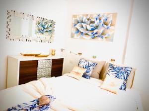 Postel nebo postele na pokoji v ubytování Luxury Bahia Sea Views By Deihu Experiences + 37 fotografií