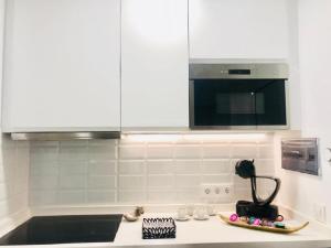 A kitchen or kitchenette at Luxury Bahia Sea Views By Deihu Experiences