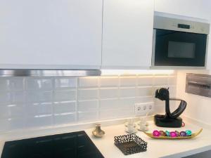 A kitchen or kitchenette at Luxury Bahia Sea Views By Deihu Experiences