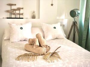 A bed or beds in a room at Luxury Bahia Sea Views By Deihu Experiences