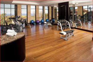 a gym with several treadmills and exercise machines at Zimbali Suite 107 in Ballito