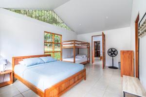 Postel nebo postele na pokoji v ubytování Finca Mango - 40 acre paradise