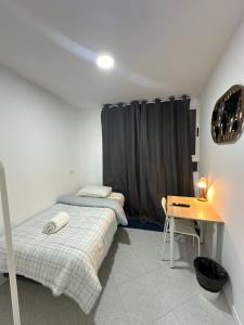 Postel nebo postele na pokoji v ubytování Rooms Mediavilla