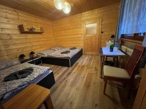 Postel nebo postele na pokoji v ubytování Penzion na Lůkách