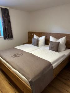 Postel nebo postele na pokoji v ubytování Sandi`s Ferienhaus