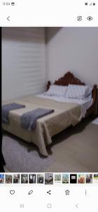 a picture of a bed in a bedroom at Grand Canal Penthouse! in Manila