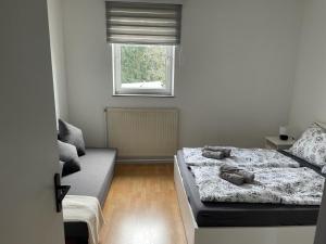 A bed or beds in a room at Apartment Paulberg